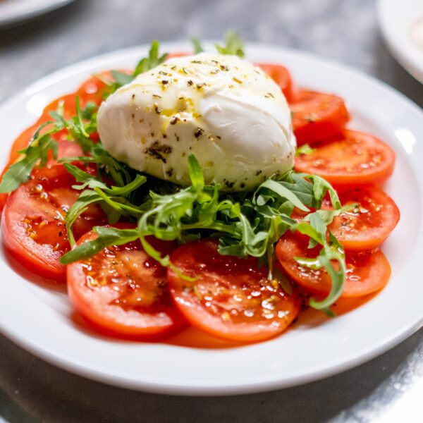 Fresh burrata with tomatoes at Florios