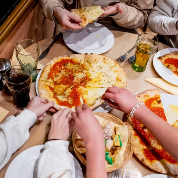 Pizzas shared around the table at Florios